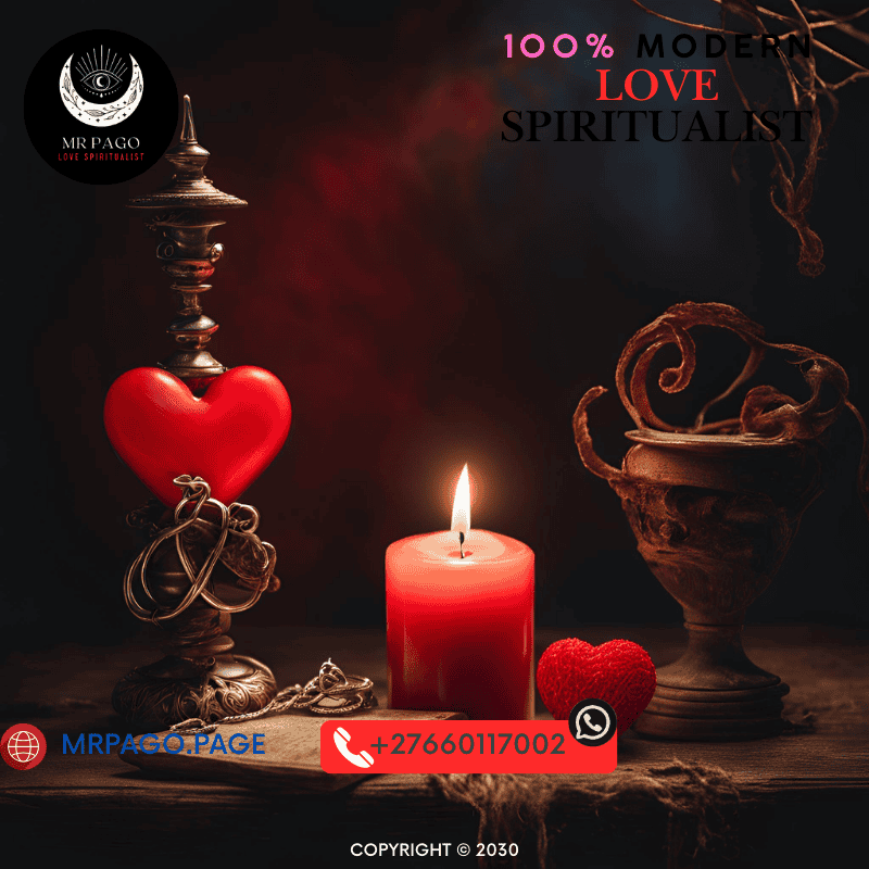 A red candle burning next to a heart-shaped charm, symbolizing love binding magic. (1)