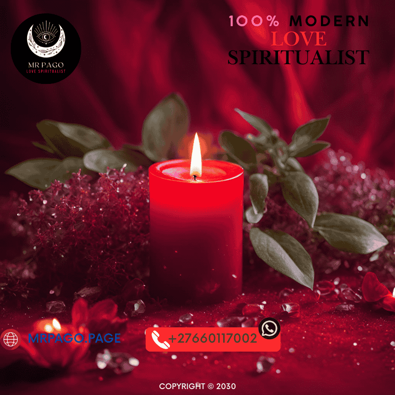 A red candle burning with herbs and crystals surrounding it, symbolizing love magic.