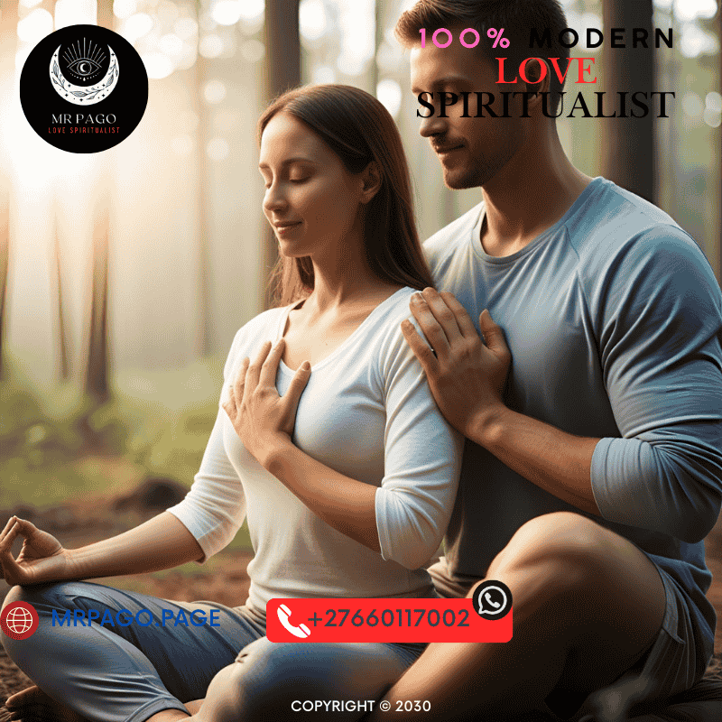 Couple meditating together with hand on heart – Spiritual ritual for clearing emotional energy
